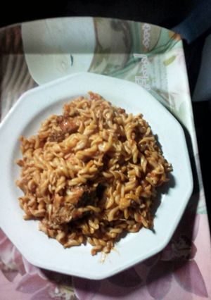 A picture of Macroni with chicken.