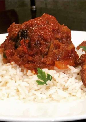 A picture of White Rice,Plantain and Stew.
