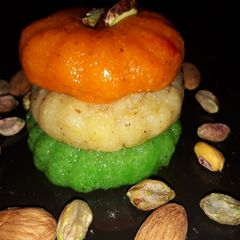 A picture of Tricolor coconut laddu.