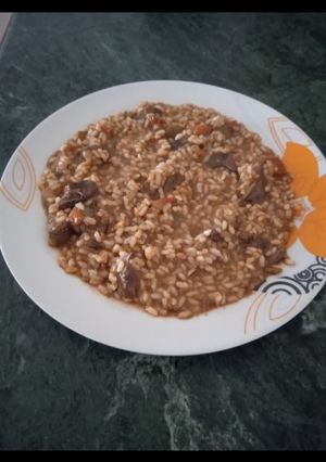 Una foto de Arroz con higaditos de pollo