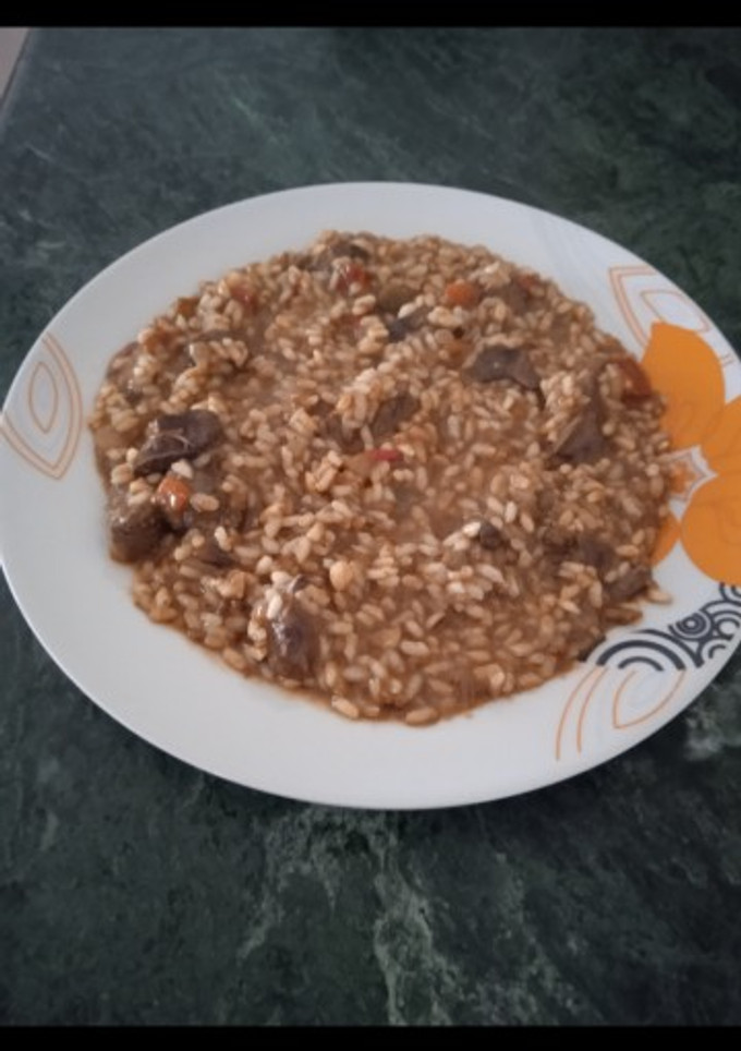 Una foto de Arroz con higaditos de pollo