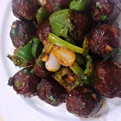 A picture of Dry veg Manchurian.
