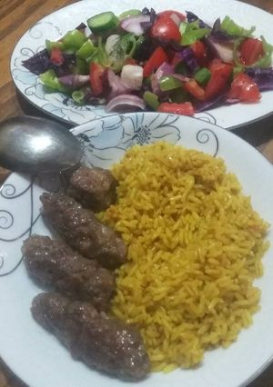 A picture of Basmati Rice with Grilled Kofta 🍅🍋.