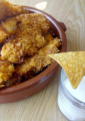 Una foto de Pollo rebozado con Doritos
