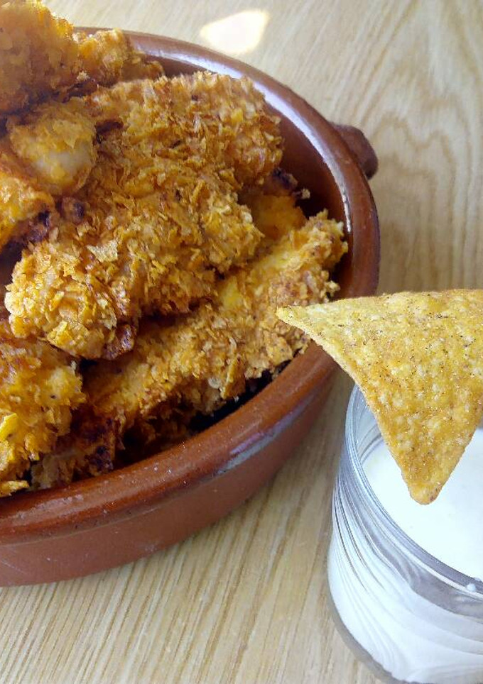 Una foto de Pollo rebozado con Doritos