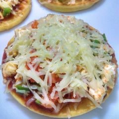 Veg Cheese Pizzette with assorted dal crust A picture of Veg Cheese Pizzette with assorted dal crust.