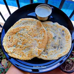A picture of Rava-urad dal dosa/Thari machkat.