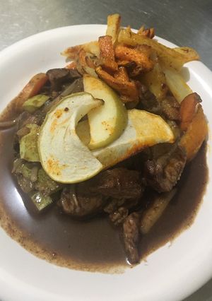 Una foto de Pollo agridulce al vino tinto