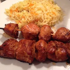 A picture of Chicken Skewers with Spicy Peanut Sauce and Fragrant Rice.