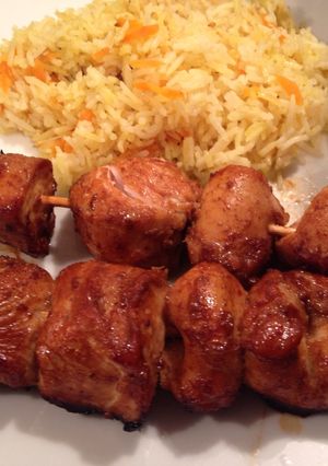 A picture of Chicken Skewers with Spicy Peanut Sauce and Fragrant Rice.