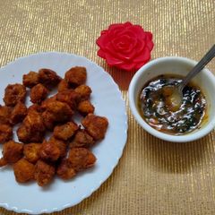 A picture of Mushroom pops with honey garlic dip.