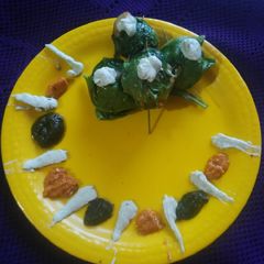 A picture of Potato roll in spinch wrap.