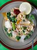 49. Pisang Mandar (Pisang Rebus Kuah Santan)