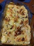 Sesos al horno gratinados con láminas de papas