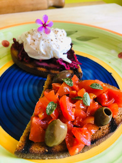 A picture of Rye Bread Bruschetta with Poached Egg 👔.
