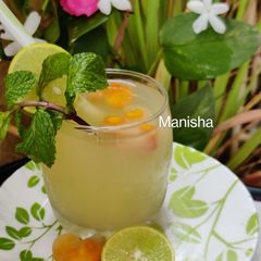 Mangonade(lemonade with Raw Mango & Ripe mango Icecubes) A picture of Mangonade(lemonade with Raw Mango & Ripe mango Icecubes).
