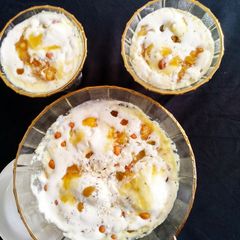 A picture of Khubani Apricot Pudding with Venilla Icecream.