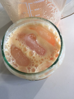 Una foto de Extracto de Zanahoria-Almendras-Cúrcuma-Naranja