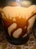 Mango shake with chocolate syrup