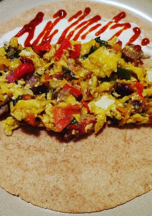 A picture of Sam's Kickin' Breakfast Burritos! 🔥🌯.