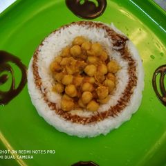 A picture of Chawal with white chana.