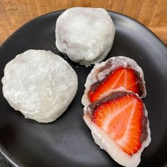 A picture of Strawberry daifuku (strawberry mochi).