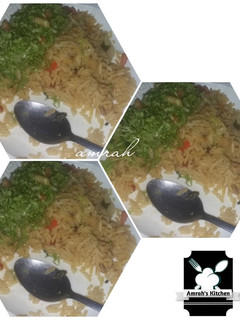 A picture of Jollof rice and salad.