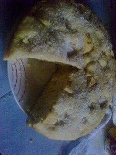 Una foto de Torta de manzana y coco