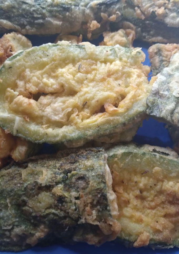 Una foto de Zucchini empanizado