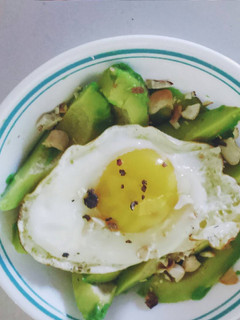 A picture of Avocado with Fried Egg.
