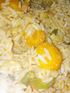 A picture of Jollof Rice and macaroni.