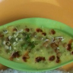 A picture of Besan Kadhi With Sprouts.