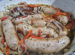 Una foto de Chorizos al vino blanco