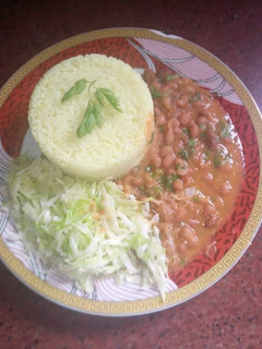 A picture of Beans Stew, Rice with Boiled cabbage.