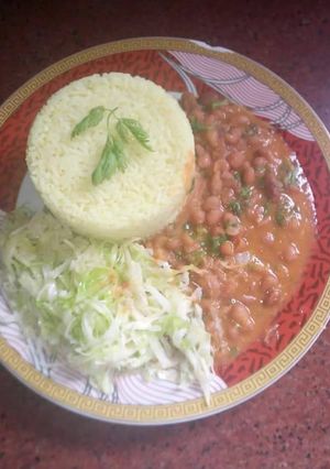 A picture of Beans Stew, Rice with Boiled cabbage.