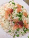 Risotto arborio with smoked salmon, green peas and watercress