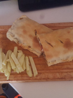 Una foto de Empanada de pollo parmesano