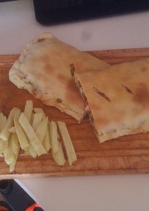 Una foto de Empanada de pollo parmesano