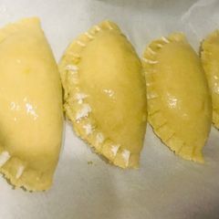 A picture of Mini baked meat pies.