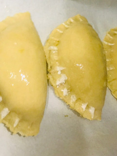 A picture of Mini baked meat pies.