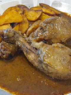 Una foto de Muslos de pollo al piri piri