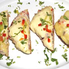 A picture of Open tuna melt sanwich.