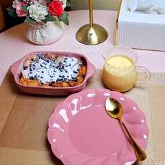 A picture of Bread Butter Pudding with Vanilla Sauce.