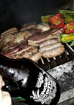 Una foto de Asado y birra