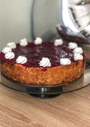 O poză a rețetei Cheesecake la cuptor cu zmeură.