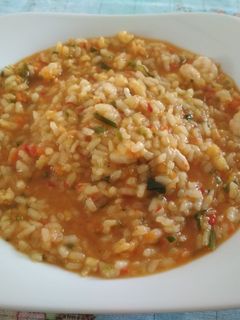 Una foto de Arroz con gambas