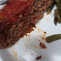 A picture of Two Meatloaf in one pan.