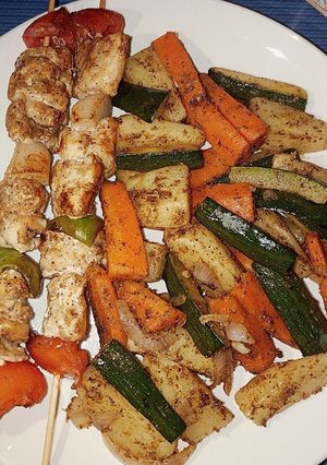 A picture of Monkfish Skewers with Sautéed Vegetables.