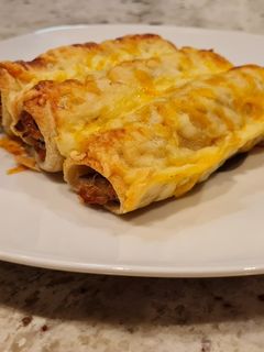 Una foto de Canelones de pollo asado y setas con pan de molde