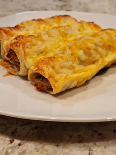 Una foto de Canelones de pollo asado y setas con pan de molde